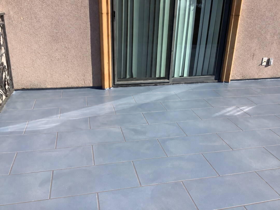 Cool gray tile finish completed by California Decking & Waterproofing