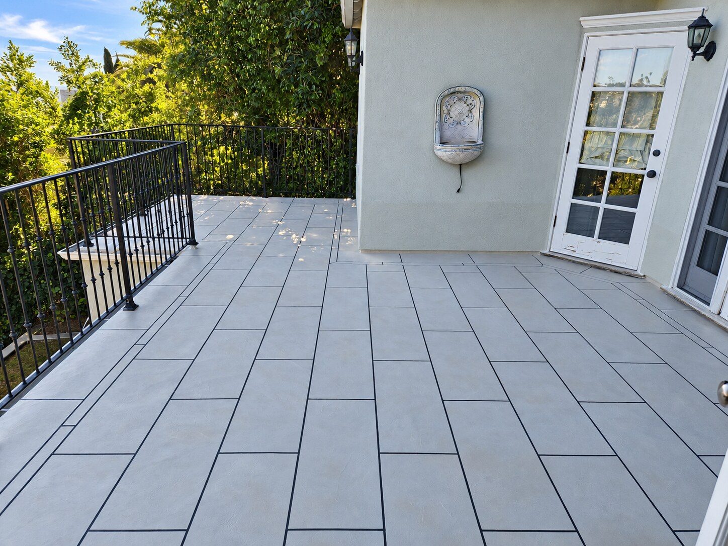 Light gray plank layout completed by California Decking & Waterproofing